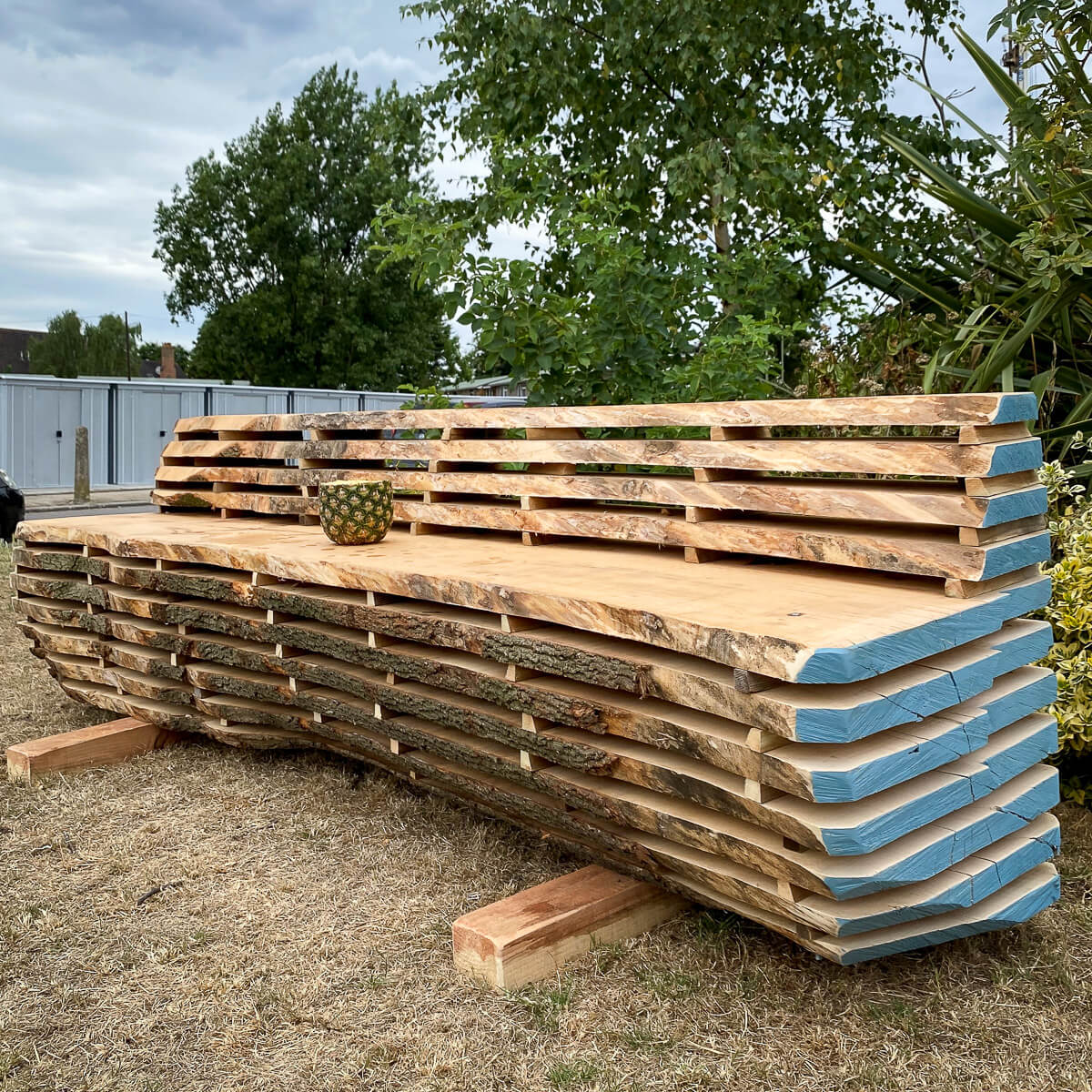 Bench made from air drying timber at Fosters Estate Hendon London