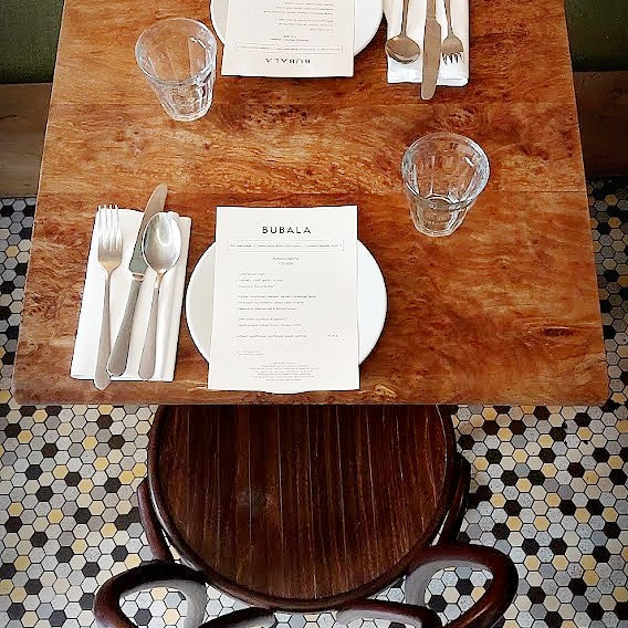 A restaurant tables made of London plane timber